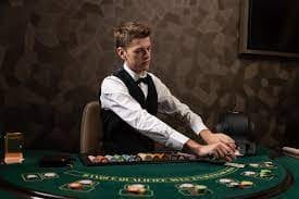 1221slot live blackjack table viewed on mobile screen with dealer broadcast